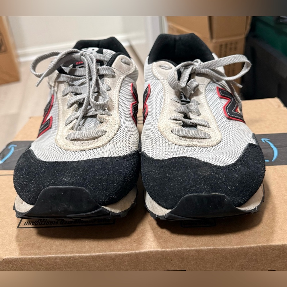 New Balance Grey and Black Sneakers with Red and White Detail